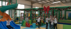 Indoor Christmas Parties for Kids: Festive Fun at Tik Tocs Prestons Children celebrating festive fun at indoor Christmas parties for kids at Tik Tocs Prestons play centre